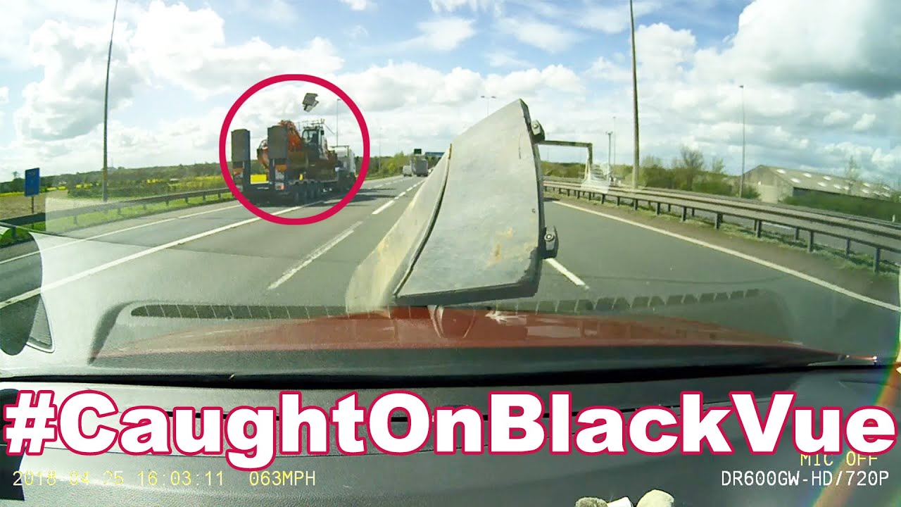 Cargo-Flies-Off-Truck-Damages-Car-On-A-Highway-CaughtOnBlackVue