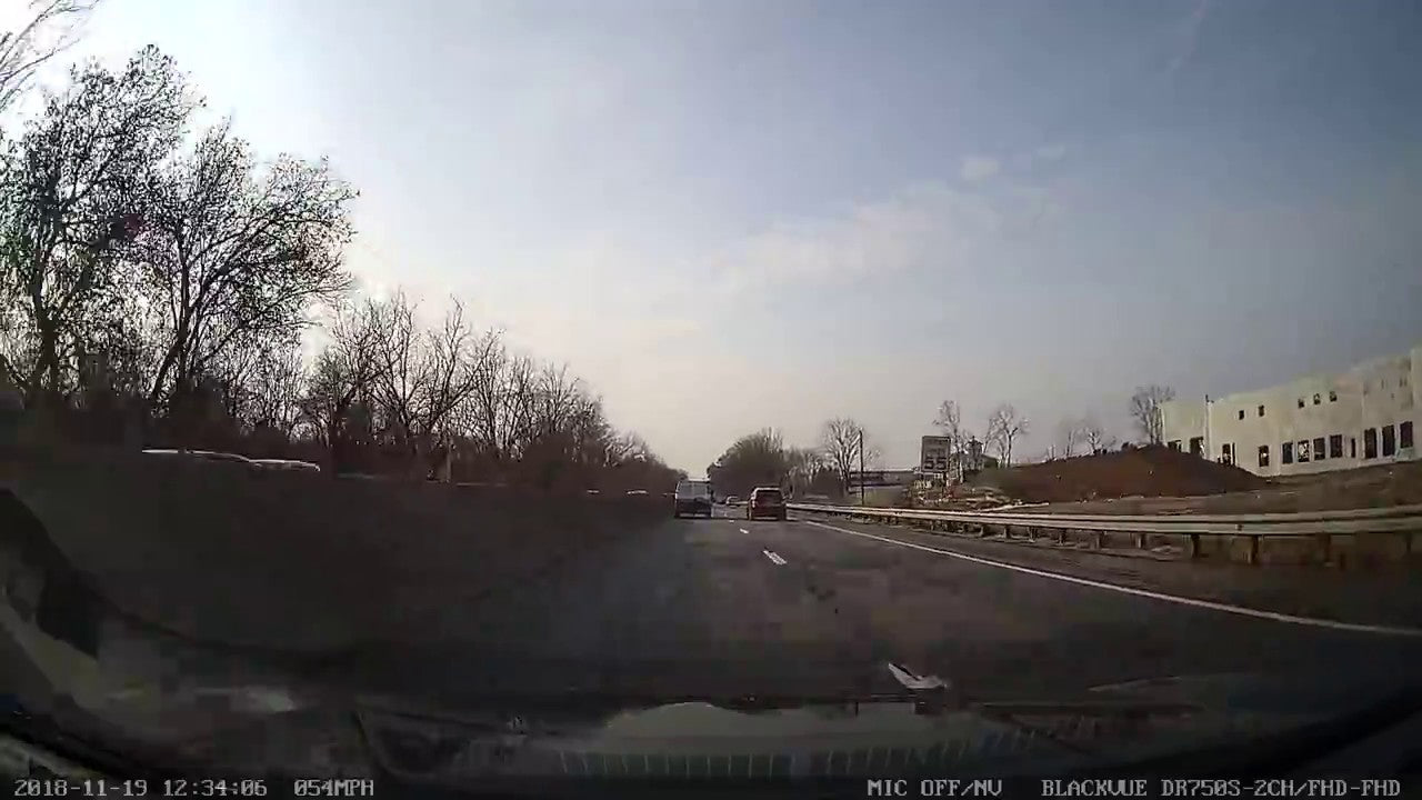 Freak-Accident-Captured-Flying-Tire-Hits-Our-Car