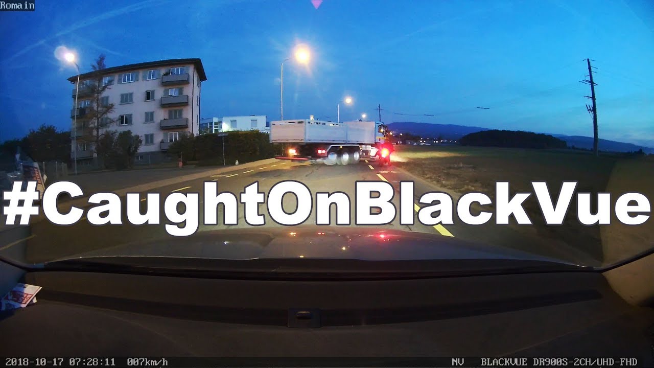 Guy-avoids-the-truck-falls-from-his-bike-CaughtOnBlackVue