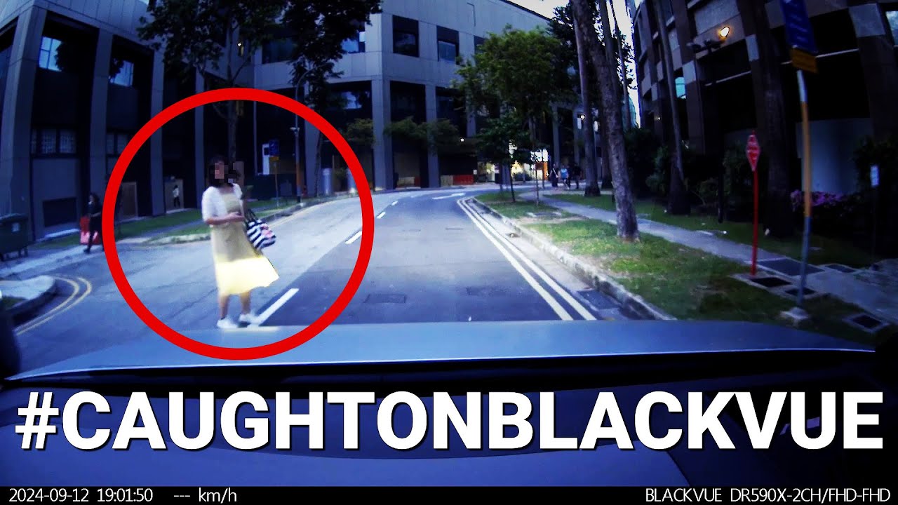 Pedestrian-Distracted-By-Smartphone-Almost-Causes-Accident-CaughtOnBlackVue (1)